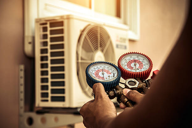 Professional Heat Pump Repair technician working in Shepherdsville, KY
